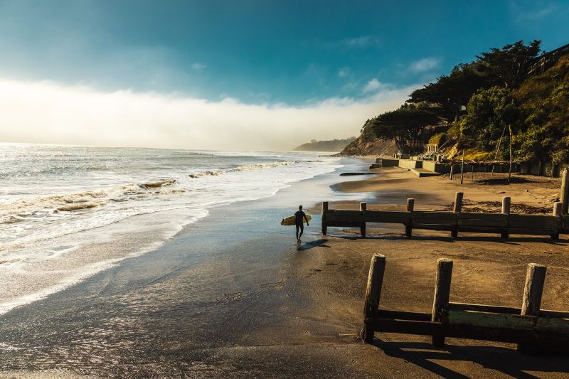 Bolinas, California. A lone surfer looking for the perfect wave