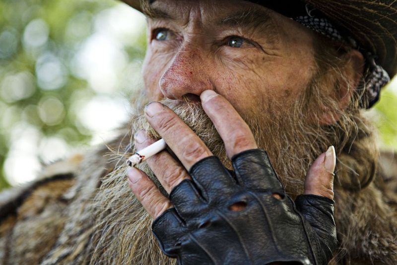 Old man smoking a cigarette at the Plaza in Albuquerque